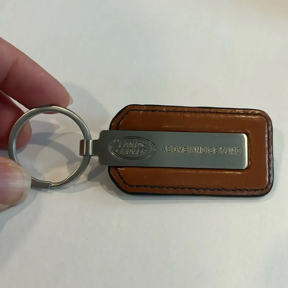 NWOT Land Rover Above And Beyond Silver Leather Key Chain